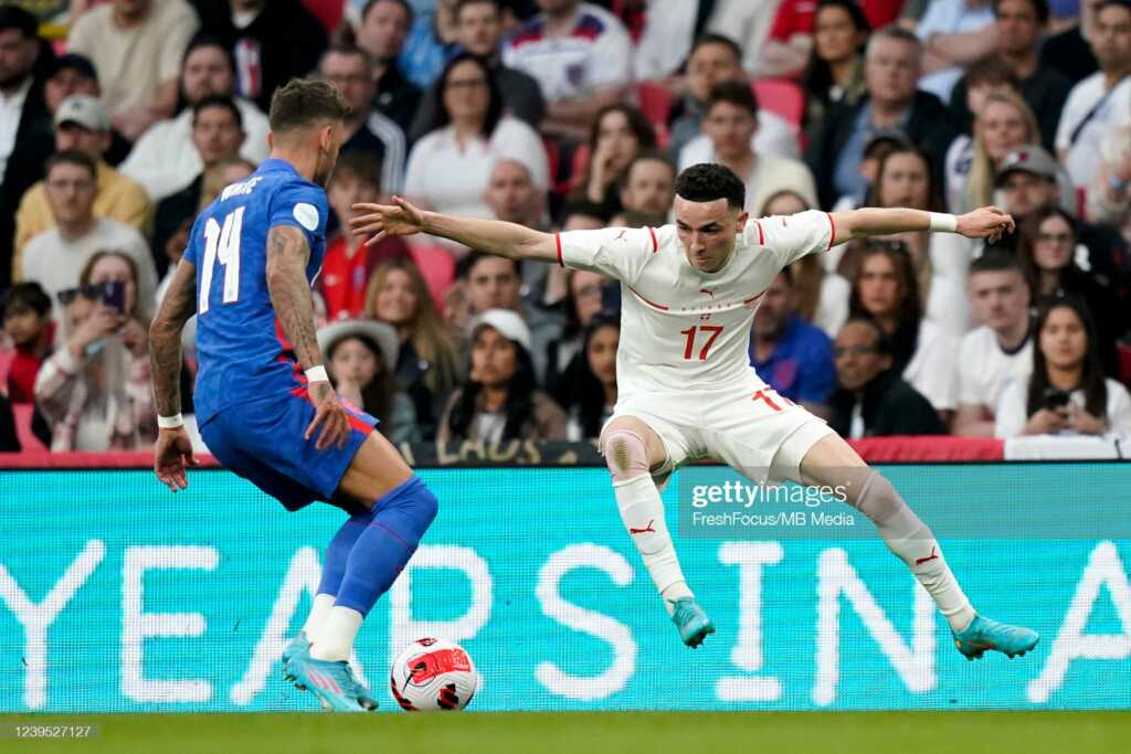 Ben White of England and Ruben Vargas of Switzerland during the international friendly match between England and Switzerland at Wembley Stadium on March 26, 2022 in London