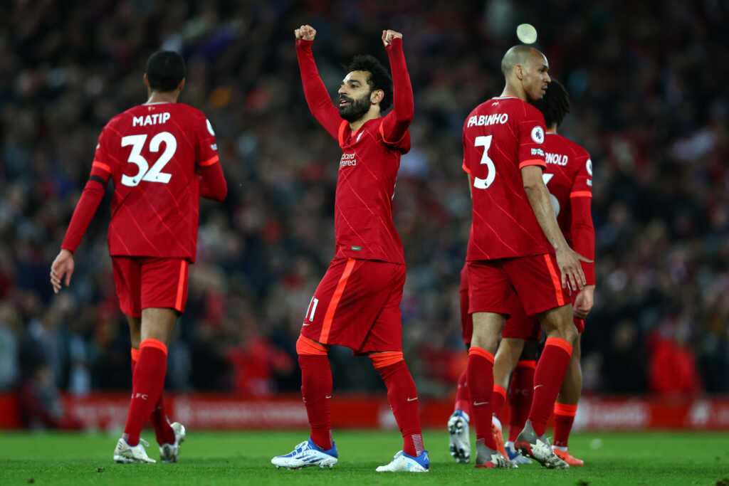 Mohamed Salah of Liverpool celebrates scoring their side's fourth goal during the Premier League match between Liverpool and Manchester United at Anfield 