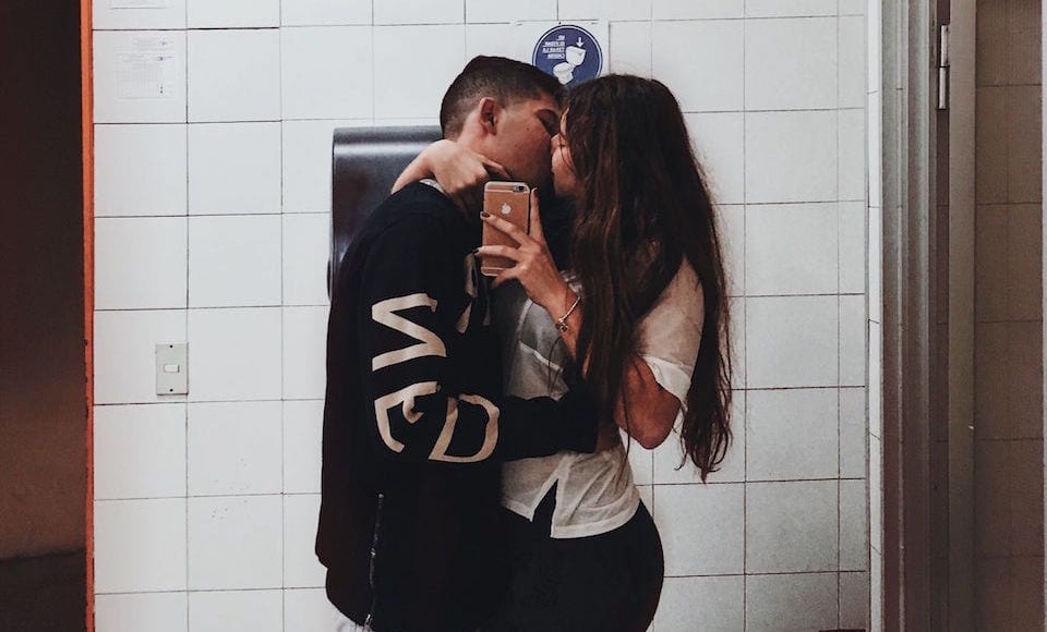 Couple Kissing in Bathroom 