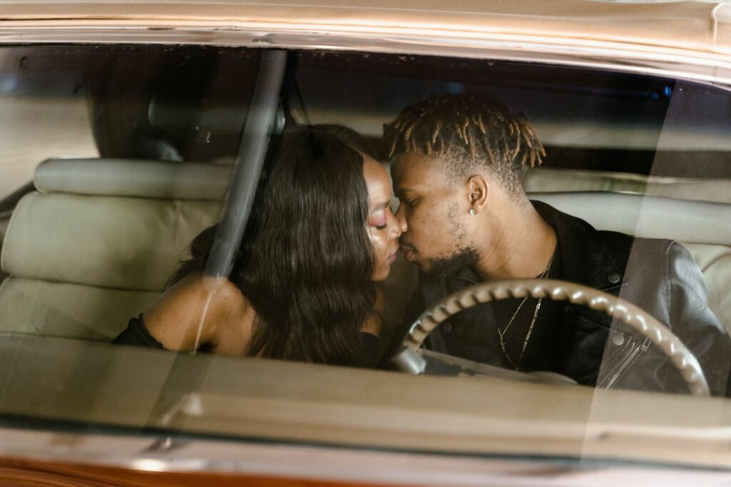 Couple Kissing in the car 