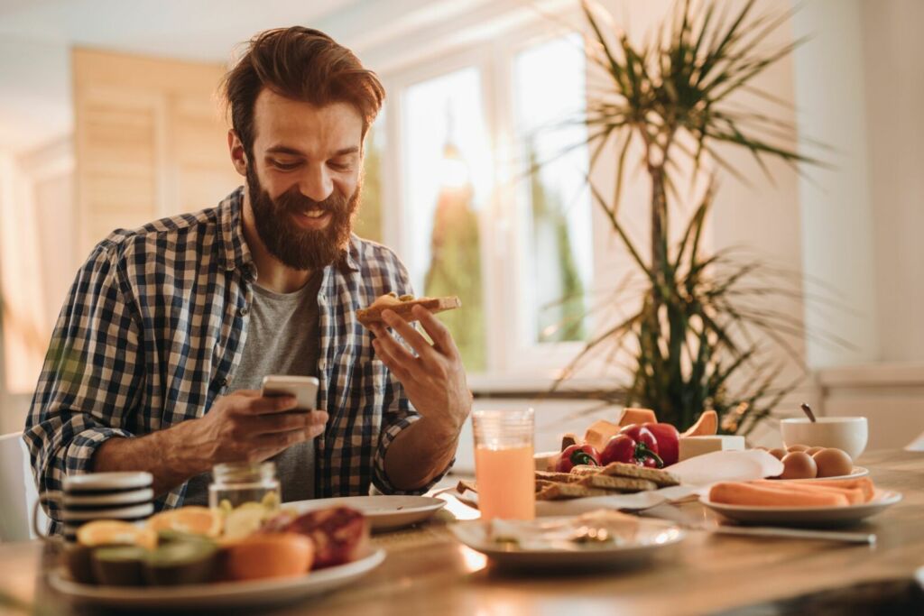 man eating breakfast