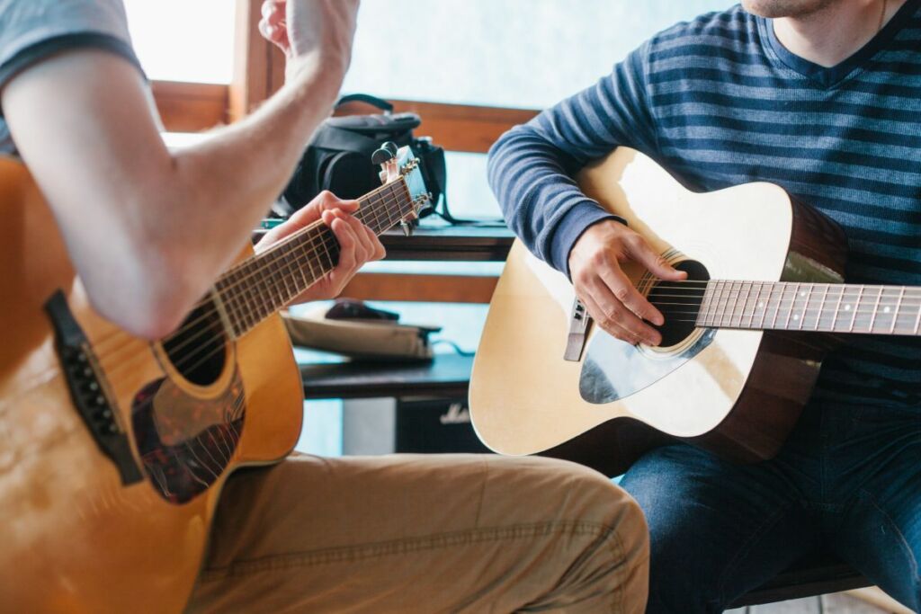 men playing guitar 