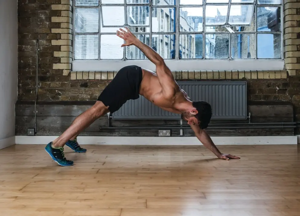 Three-Point Reach Plank