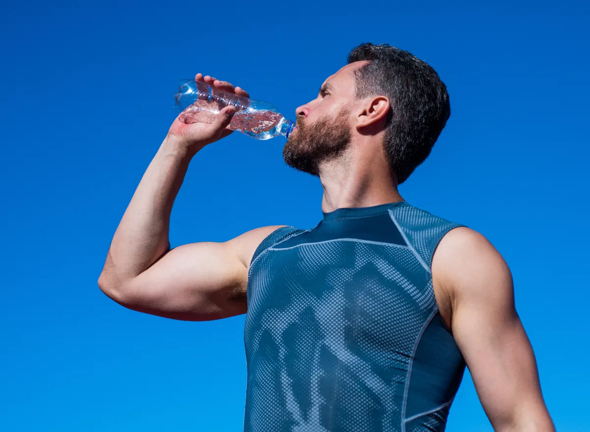 man drinking water