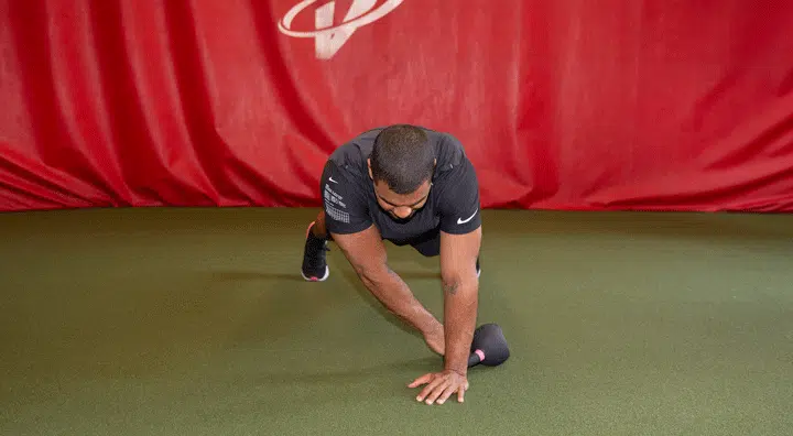 Plank Kettlebell Pull-Throughs