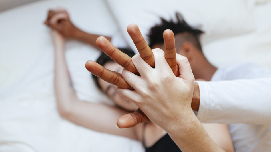 couple holding hands 