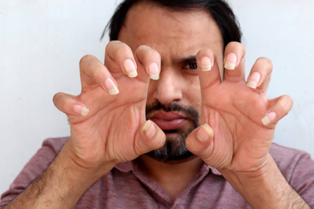 man with long nails