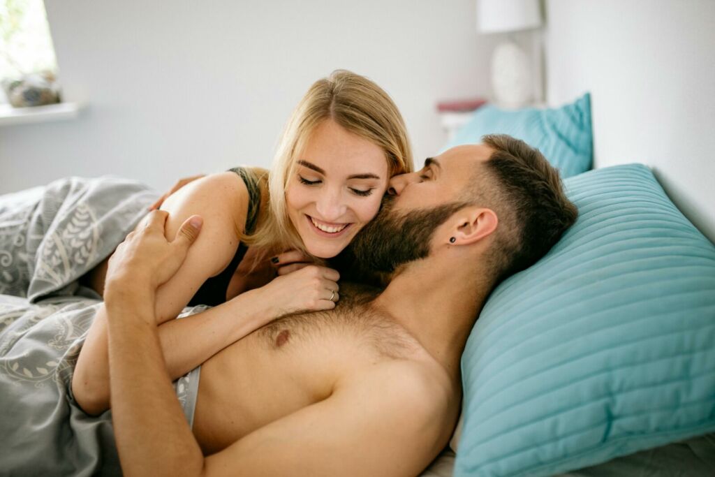 Couple Lying Down on Bed