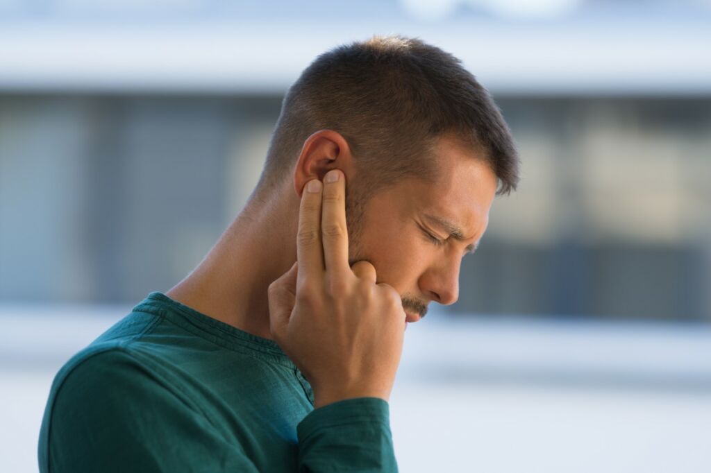 Pain in the jaw, behind the ear, and upper back