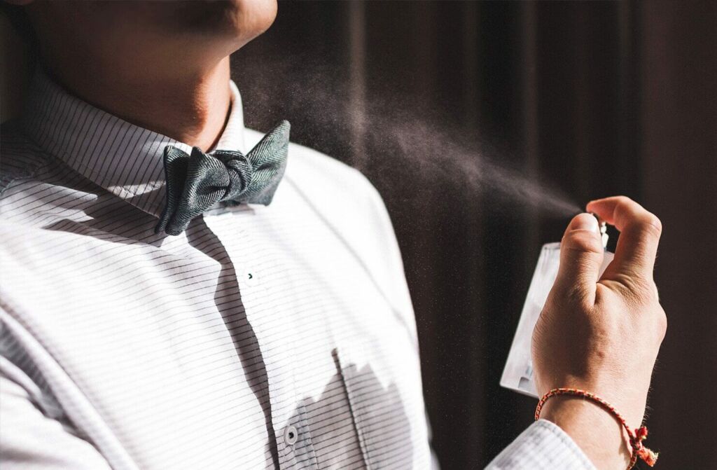 Man Applying Fragrance 