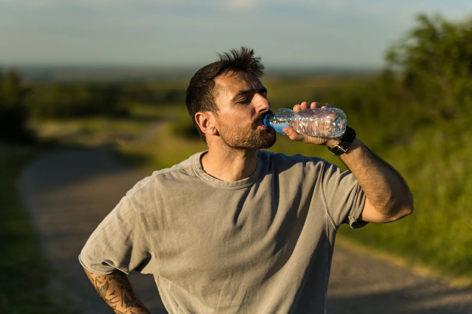 man drinking water 