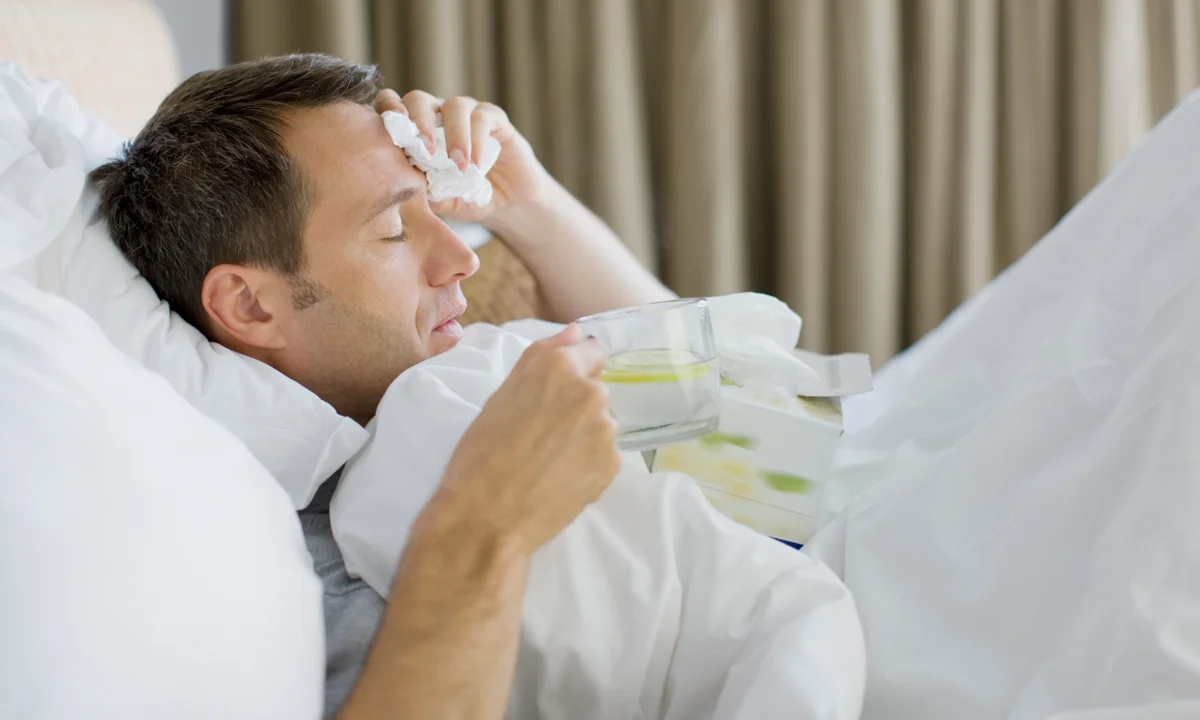 Man Lying In Bed